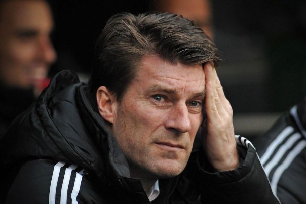 Michael Laudrup havde helst set kampen afgjort, men må nu i omkamp mod Arsenal. Foto: CARL COURT